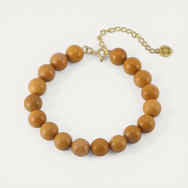 צמיד Mokit עשוי מאבני Mookaite טבעיות בגוון צהוב חמים עם סוגר כסף 925 בציפוי זהב 14 קראט